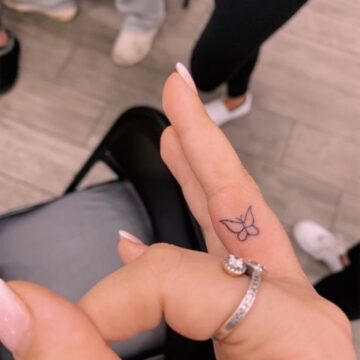 butterfly tattoo on finger