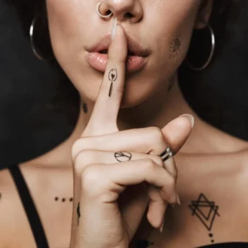 woman tattoo by woman artist White Iris